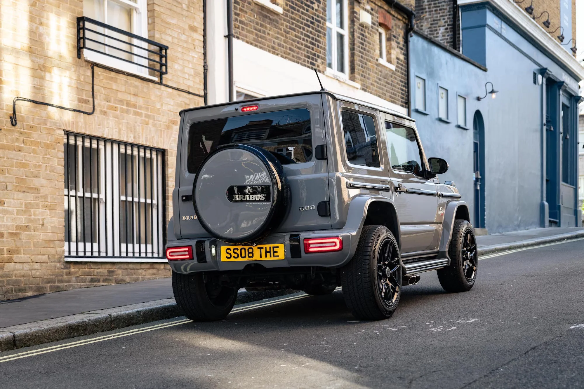 Suzuki Jimny Brabus Grey Rearview on a Uphill