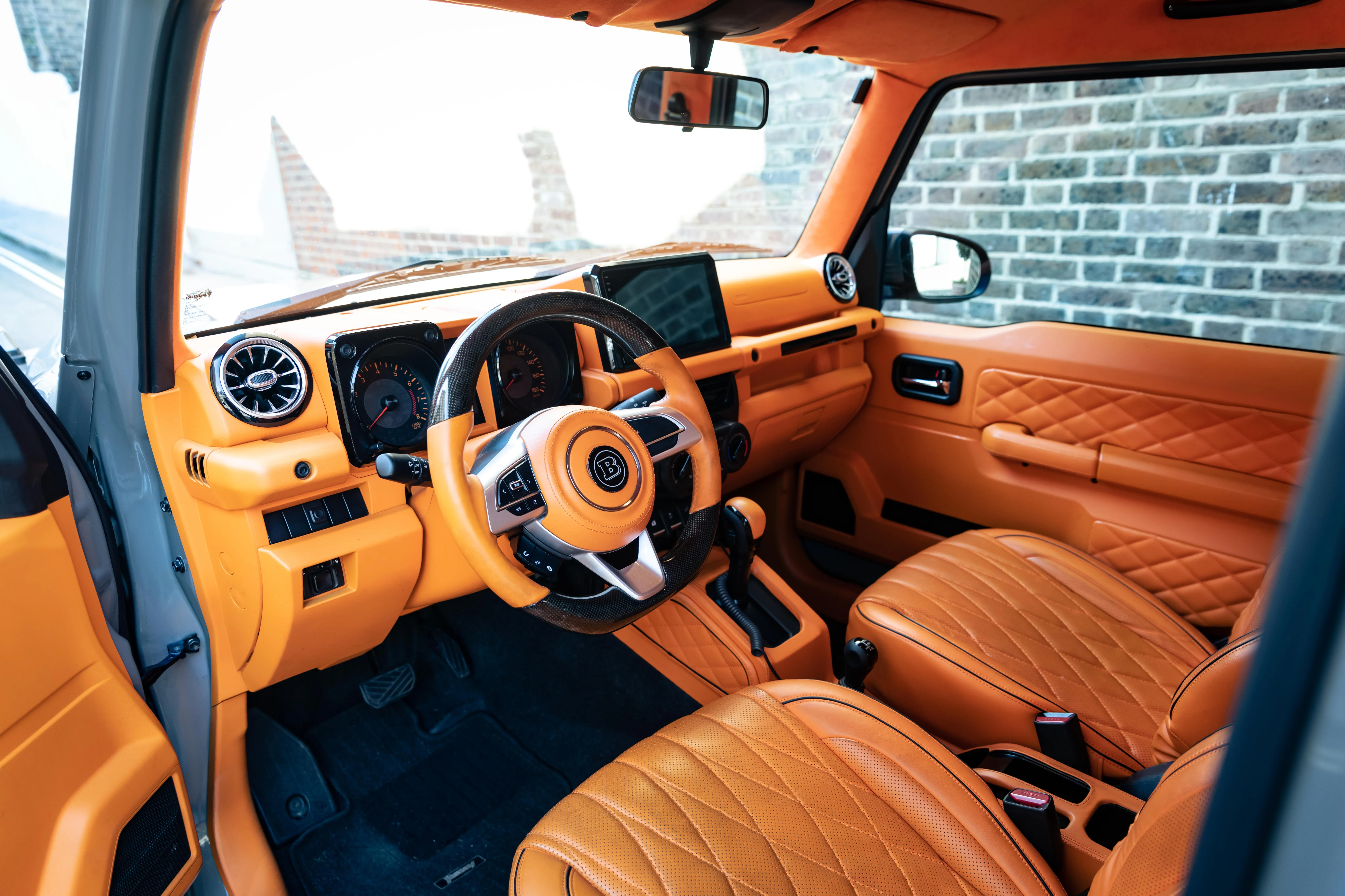 Suzuki Jimny Brabus Orange Interior Driver Side Dash View